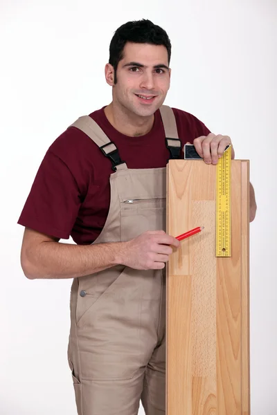 Tiler fazendo medições — Fotografia de Stock
