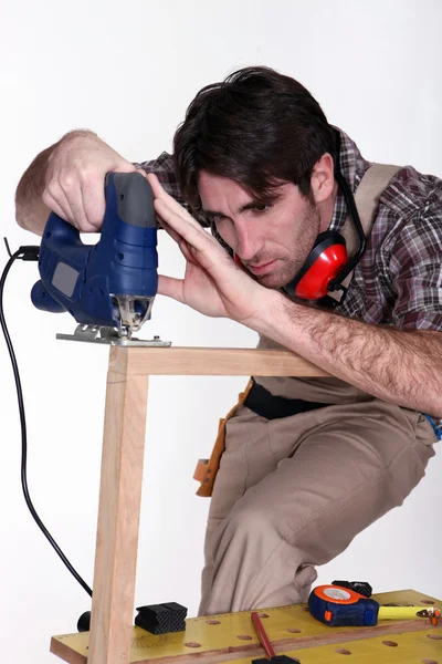 Craftsman working with a drill — Stock Photo, Image