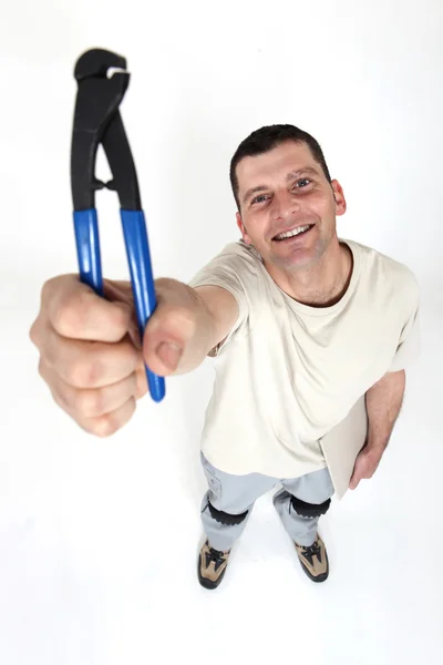 Man showing pliers — Stock Photo, Image