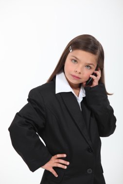 Little girl dressed as businesswoman clipart