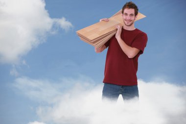 Happy carpenter standing in a cloud clipart