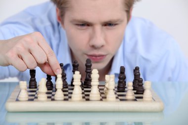 Man playing chess clipart