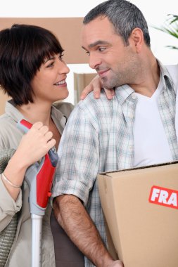 Couple moving into new home clipart