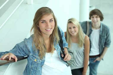 Teens in escalator clipart