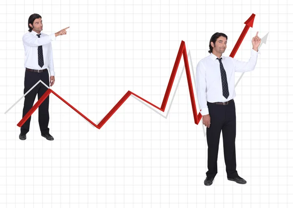 Businessman on a growth chart — Stock Photo, Image