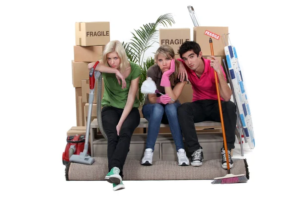 Tired friends on moving day — Stock Photo, Image