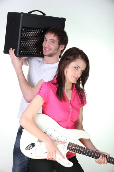 Jongen en meisje in een muziekband — Stockfoto