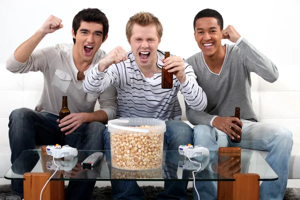 Three teenagers having a party at home — Stock Photo, Image