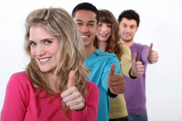 Young group of giving the thumb's up — Stock Photo, Image