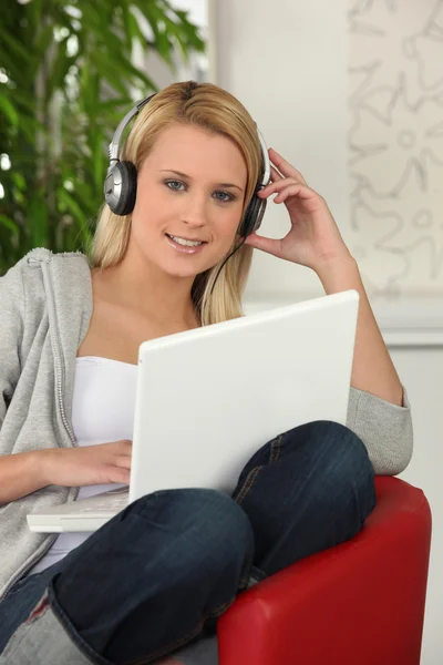 Woman with headphones Royalty Free Stock Photos