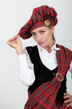 Woman in Scottish costume clipart