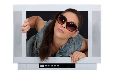 Woman coming out of a television screen clipart