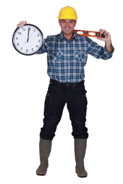 Construction worker holding clock clipart