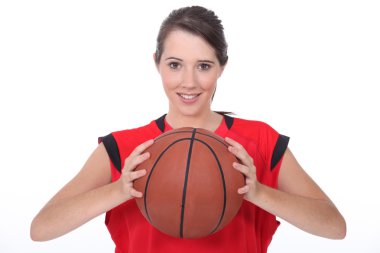 A young female basket-ball player clipart