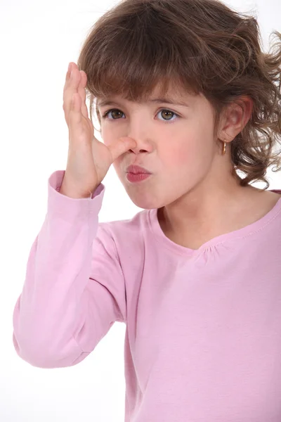 Little girl making a grimace — Stock Photo, Image