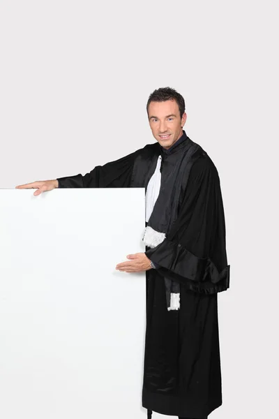 Man in black gown — Stock Photo, Image