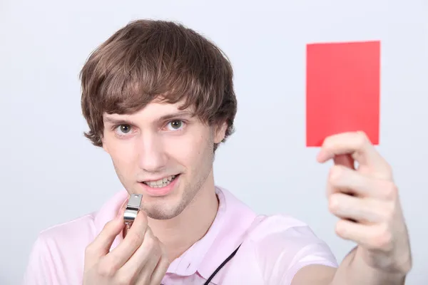 Adolescente sosteniendo una tarjeta roja — Foto de Stock
