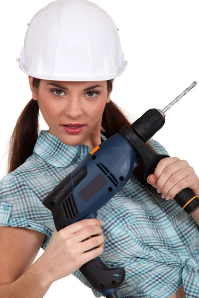 Mujer posando con un taladro eléctrico —  Fotos de Stock