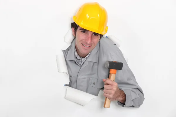 Construction worker with a mallet — Stock Photo, Image