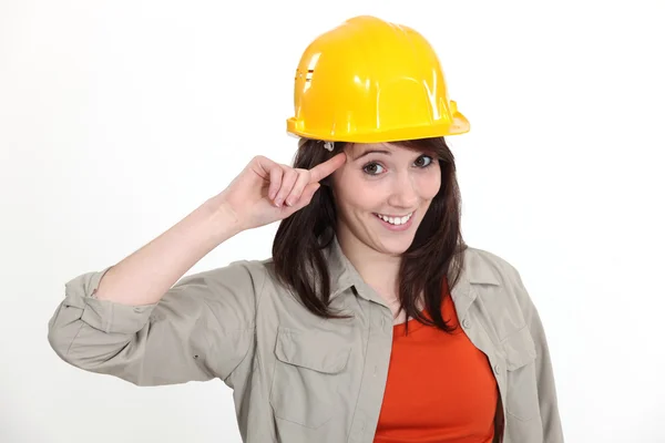 Ένα θηλυκό κατασκευή εργαζόμενος gesturing ον τρελό. — Φωτογραφία Αρχείου