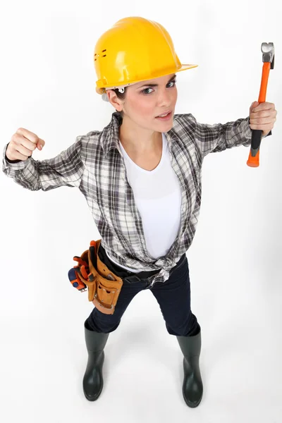 A female construction worker in a fighting stance. — Stock Photo, Image