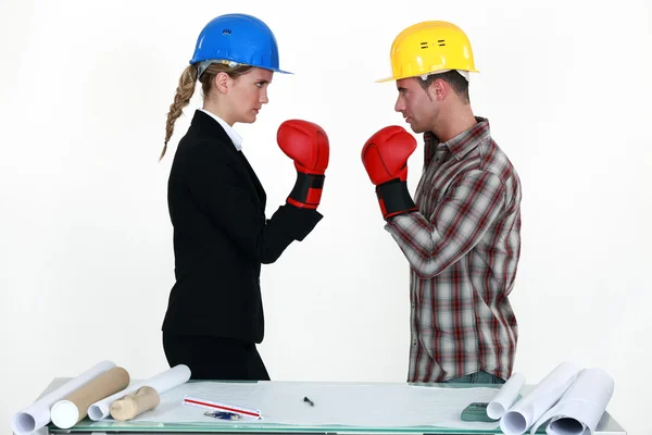 Architect and builder boxing