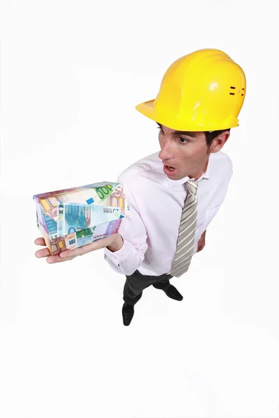 Engineer shocked to discover the money required to pay for his new project — Stock Photo, Image