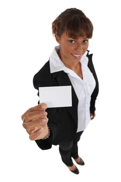 Woman presenting her business card — Stock Photo, Image