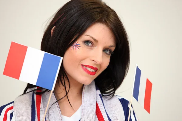 Mujer ondeando la bandera francesa — Foto de Stock