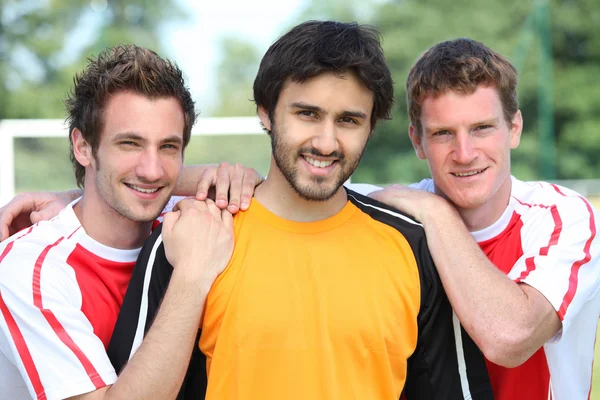Portrait de 3 joueurs de football — Photo