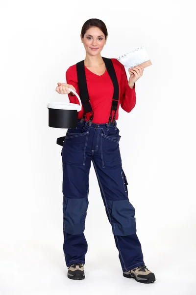 Woman plasterer on white background Stock Picture