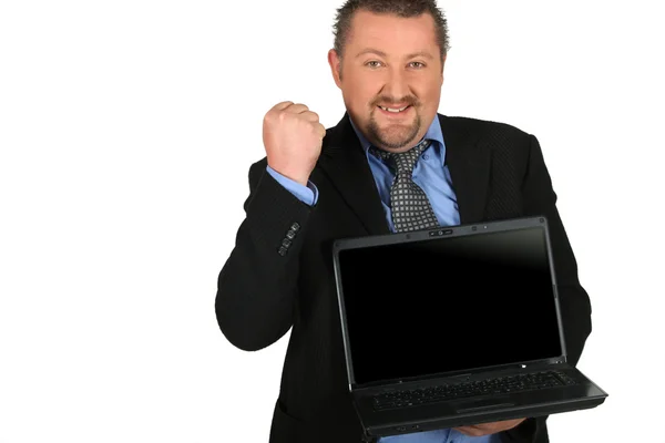 Businessman holding laptop Royalty Free Stock Photos