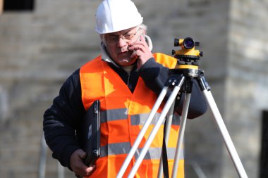 Man surveying site clipart