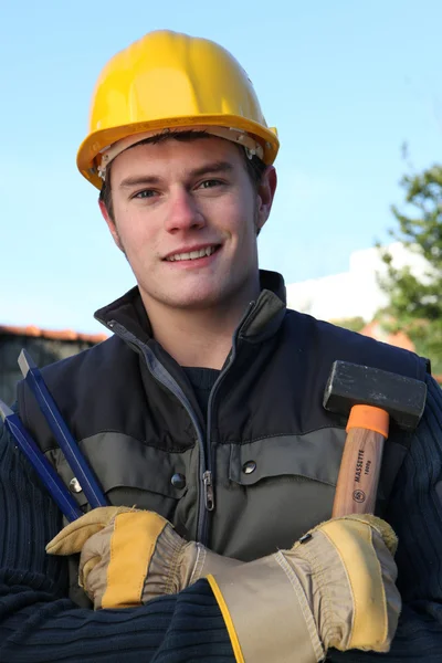 Trabajador sosteniendo martillo y cincel —  Fotos de Stock