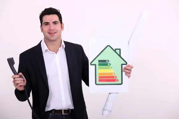 An architect promoting energy savings. — Stock Photo, Image