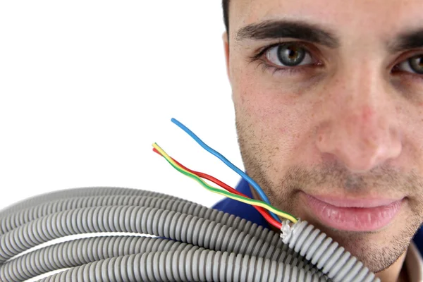 Electrician with conduit — Stock Photo, Image