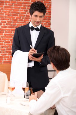 Waiter in a restaurant clipart