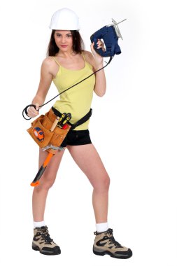 Sexy craftswoman posing clipart