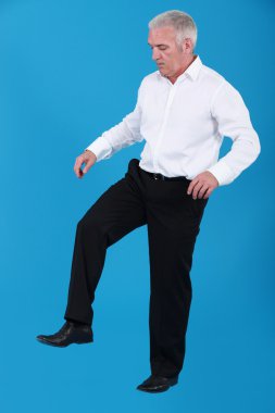 Man in stomping position clipart