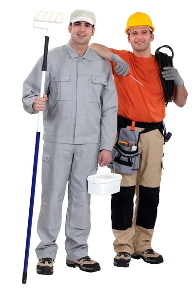 Painter and electrician standing on white background — Stock Photo, Image