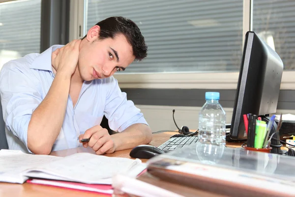 Embarrassed employee at work — Stock Photo, Image
