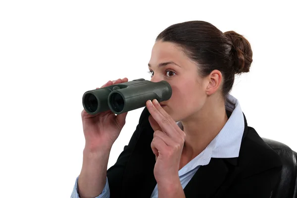 Office worker with a pair of binoculars — Stock Photo, Image