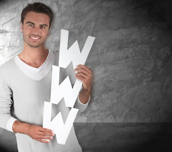 Young man holding the letters WWW — Stock Photo, Image