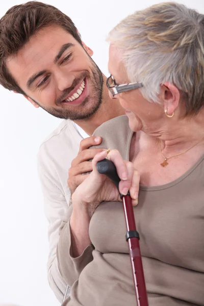 Portrait of a young man and older woman — Stock Photo, Image