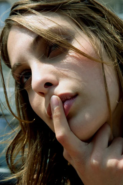 Close-up shot of pensive woman — Stock Photo, Image