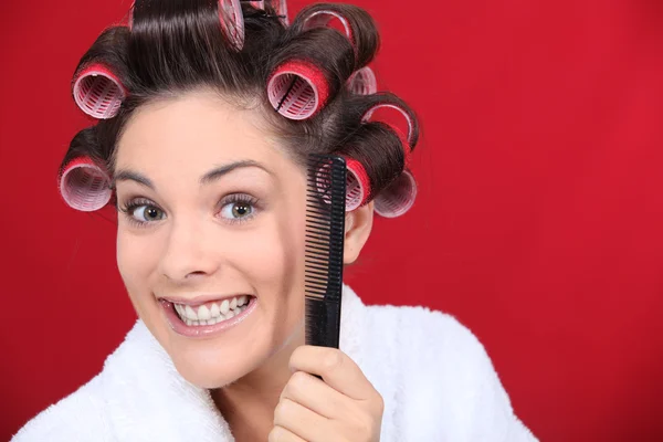 stock image Woman wearing curlers on the head