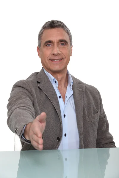 Man giving his hand for a handshake — Stock Photo, Image