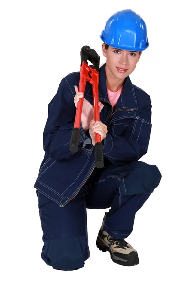 Handwerkerin mit Schraubenschlüssel — Stockfoto