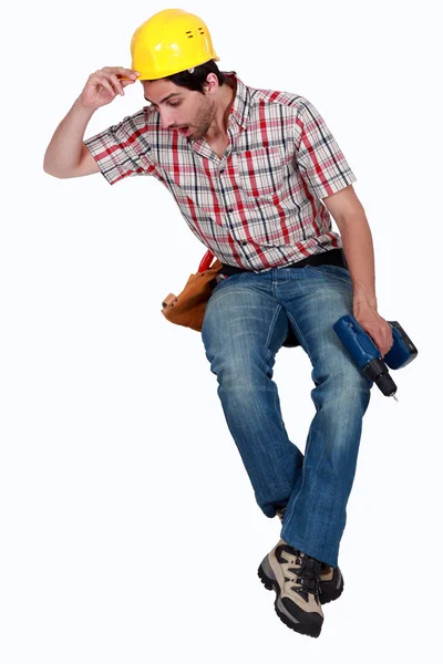 Scared tradesman spotting a spider — Stock Photo, Image