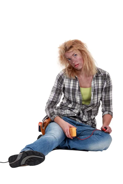 Clumsy woman electrician — Stock Photo, Image